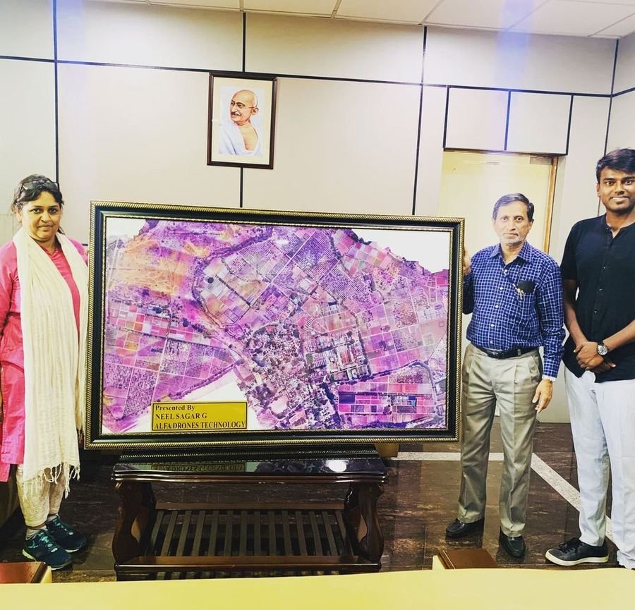 Framed high-resolution orthomosaic of a mapped village handed over to department officials