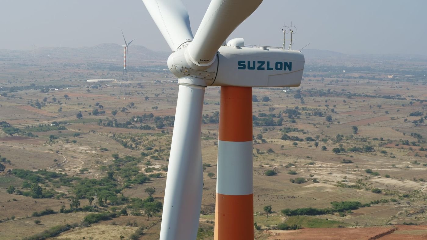Suzlon wind turbine nacelle and rotor photographed from a drone during an inspection flight